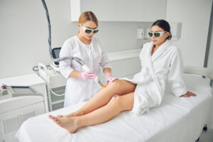 calm-young-dark-haired-woman-safety-goggles-sitting-couch-cosmetic-procedure-scaled.jpg