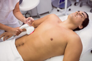 man-receiving-laser-hair-removal-treatment-scaled.jpg